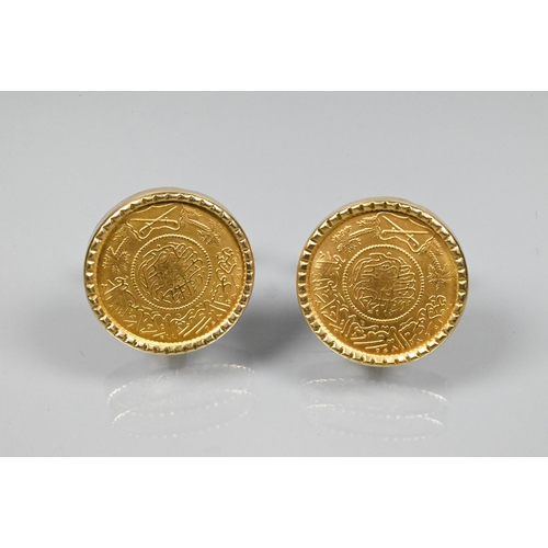 366 - A pair of Persian coin-set cufflinks in yellow metal mount with swivel backs, stamped 750, 2.3 cm di... 