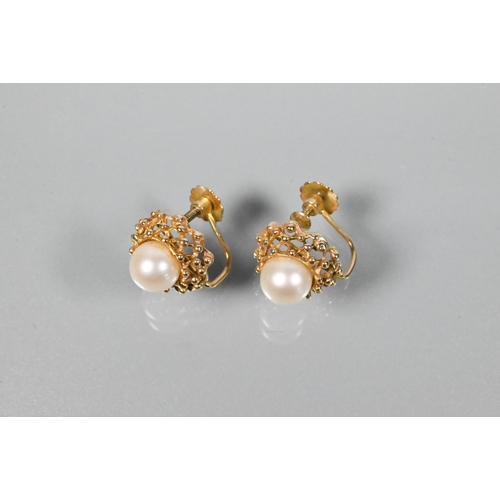 368 - A pair of cultured pearl set earrings in open beadwork mounts, screw fittings, stamped 9ct