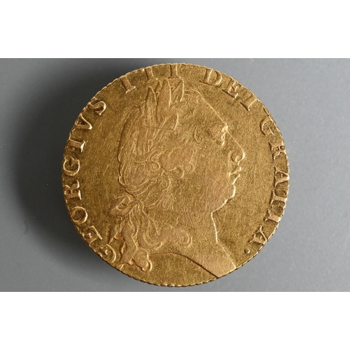 489 - A George III gold half guinea dated 1793, 24mm diam, 8.4g