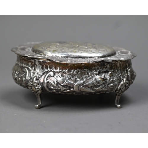 49 - German .800 grade oval trinket box with embossed and chased decoration, on three scroll feet, 4oz, 1... 