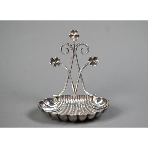 61 - Edwardian silver watch stand with scrolling shamrock-embellished bracket and scalloped base, Hilliar... 