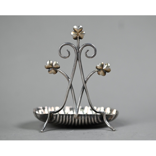 61 - Edwardian silver watch stand with scrolling shamrock-embellished bracket and scalloped base, Hilliar... 