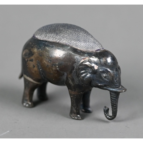 62 - Edwardian silver novelty 'elephant' pin-cushion, Adie & Lovekin Ltd, Birmingham 1906, 3 x 4.5cm