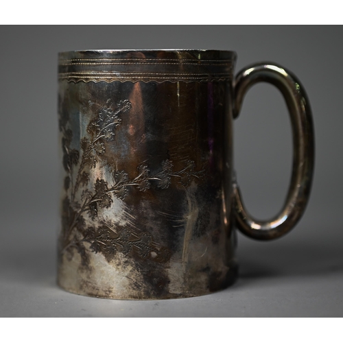 78 - A silver Christening mug of tapering form with foliate engraving, Birmingham 1919, to/w a Victorian ... 