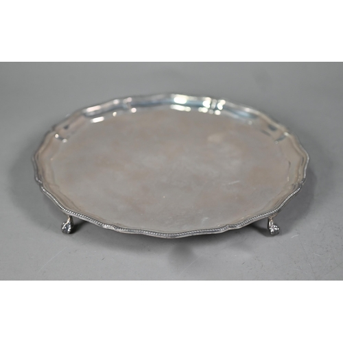 80 - A silver letter salver with moulded and beaded rim, on four claw and ball feet, Barker Ellis Silver ... 