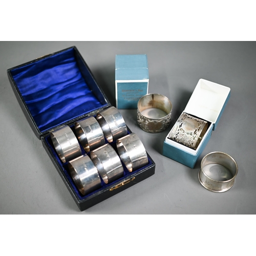 83 - WITHDRAWN A set of six plain silver napkin rings, Joseph Gloster Ltd, Birmingham 1922, in associated... 