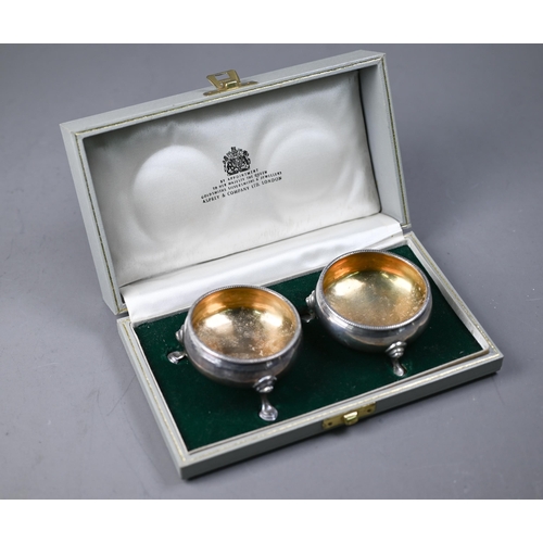 84 - WITHDRAWN Pair of George III silver circular salts with beaded rims and hoof feet, Thomas Shepherd (... 