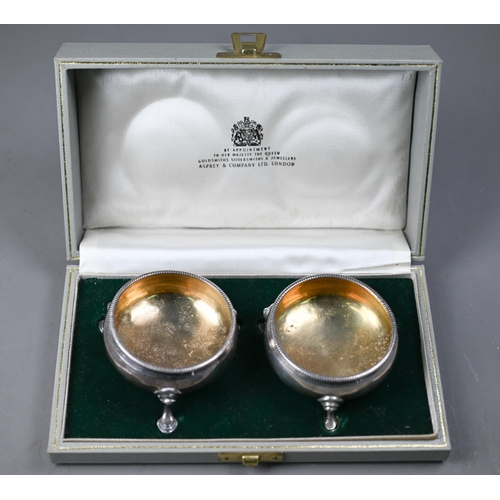 84 - WITHDRAWN Pair of George III silver circular salts with beaded rims and hoof feet, Thomas Shepherd (... 