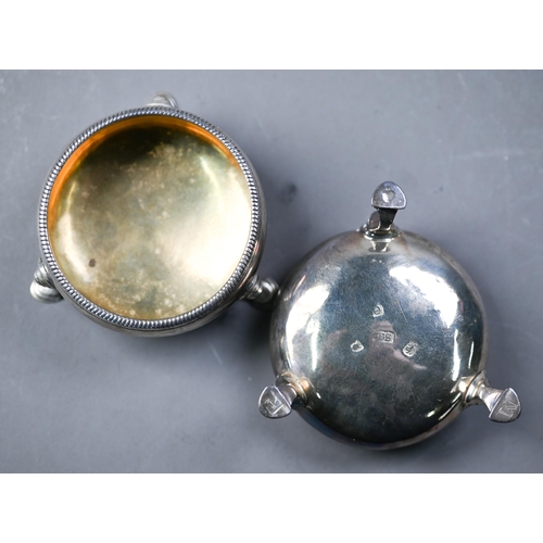 84 - WITHDRAWN Pair of George III silver circular salts with beaded rims and hoof feet, Thomas Shepherd (... 