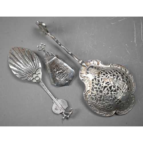 86 - Antique French silver skimming spoon with decorative pierced bowl and scrolling stem, bears crowned ... 