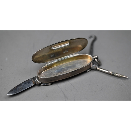 88 - WITHDRAWN Victorian silver vesta case with integral penknife, button-hook and propelling pencil, Sam... 