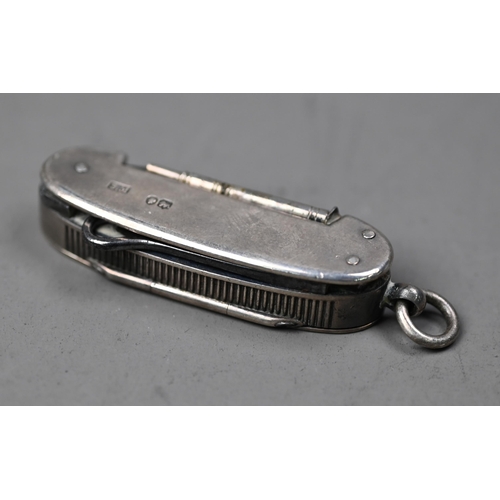 88 - WITHDRAWN Victorian silver vesta case with integral penknife, button-hook and propelling pencil, Sam... 