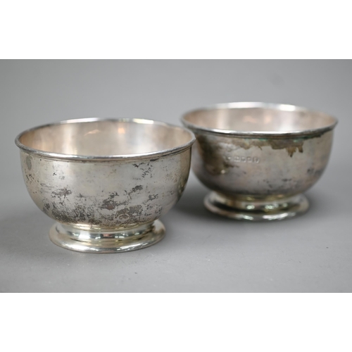 92 - A pair of heavy silver sweetmeat bowls on raised foot-rims, Harrods Ltd, London Jubilee marked 1935,... 