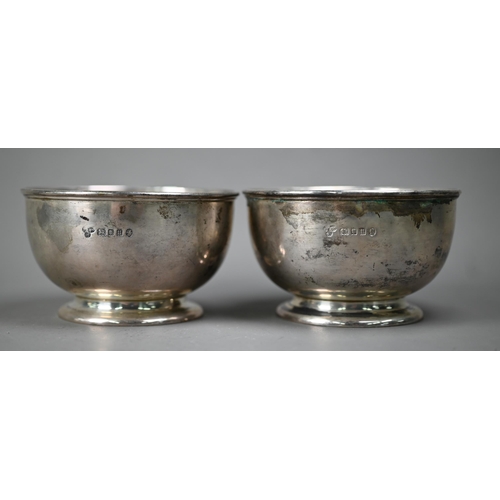 92 - A pair of heavy silver sweetmeat bowls on raised foot-rims, Harrods Ltd, London Jubilee marked 1935,... 