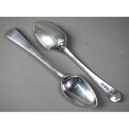 95 - A set of eleven George III silver feather-edge teaspoons, George Smith IV, London 1797, to/w a Georg... 