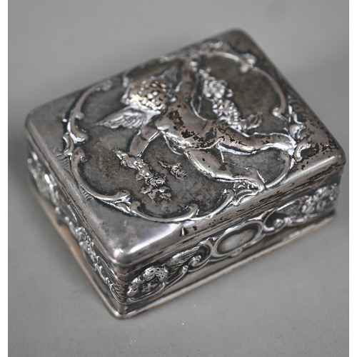 96 - An Edwardian silver trinket box and cover, embossed with cherubs, Goldsmiths and Silversmiths Co Ltd... 