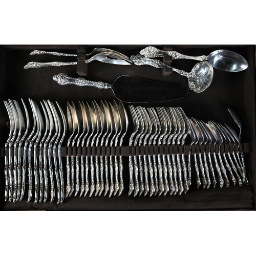 221 - A set of US Sterling Old Orange Blossom pattern flatware and cutlery for twelve settings, including ... 