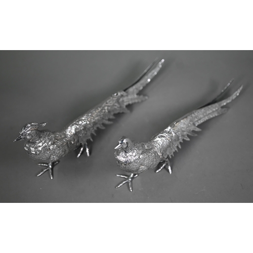 233 - Two silver-plated pheasant table-ornaments, 30 cm long