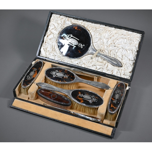 237 - A cased silver and tortoiseshell six piece brush set with pique-work decoration, London 1915, to/w a... 