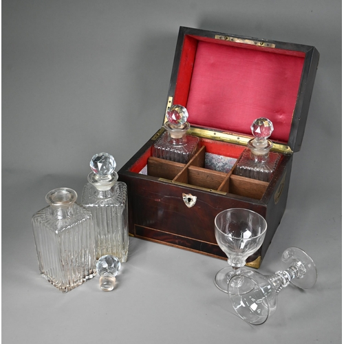 1001 - A Georgian brass-bound mahogany campaign box, converted to a decanter box with four matching antique... 