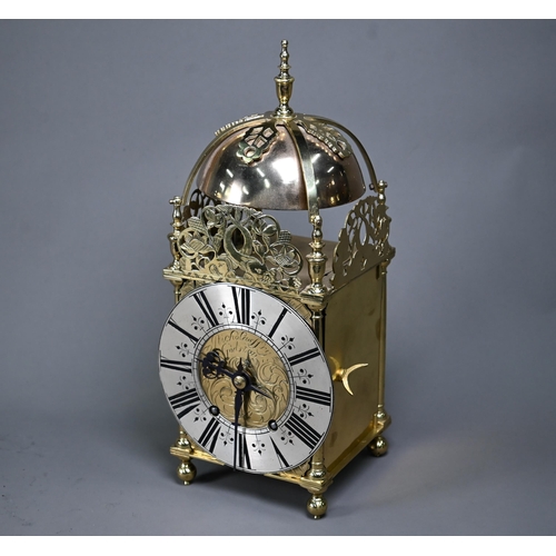 1006 - A late 19th century brass lantern clock, the 8-day two train movement signed AD Mougin, striking the... 