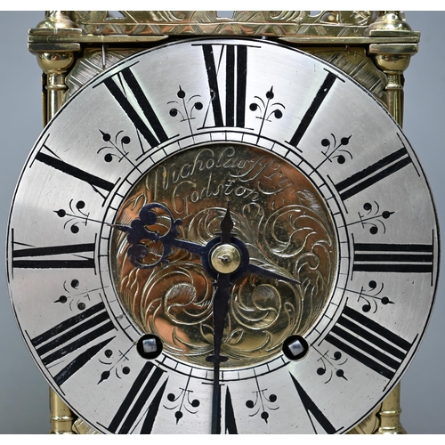 1006 - A late 19th century brass lantern clock, the 8-day two train movement signed AD Mougin, striking the... 