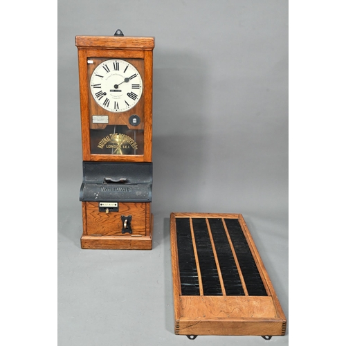 1011 - The National Time Recording Co. Ltd, a vintage oak cased time clock, with card slots and key, 98 cm ... 