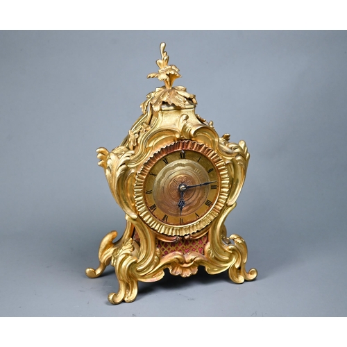 1015 - A French gilt ormolu cased 8-day fusee mantel clock, in the rococo style, with engine turned dial, 3... 