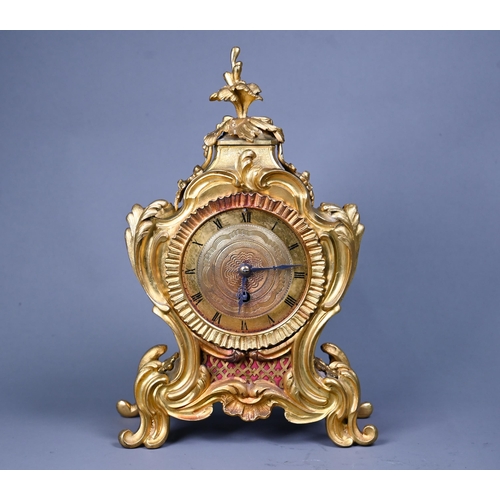 1015 - A French gilt ormolu cased 8-day fusee mantel clock, in the rococo style, with engine turned dial, 3... 