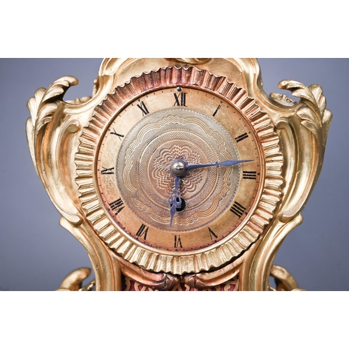 1015 - A French gilt ormolu cased 8-day fusee mantel clock, in the rococo style, with engine turned dial, 3... 