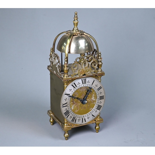 1016 - A contemporary miniature brass lantern clock, the 8-day movement striking the hours and half hours o... 