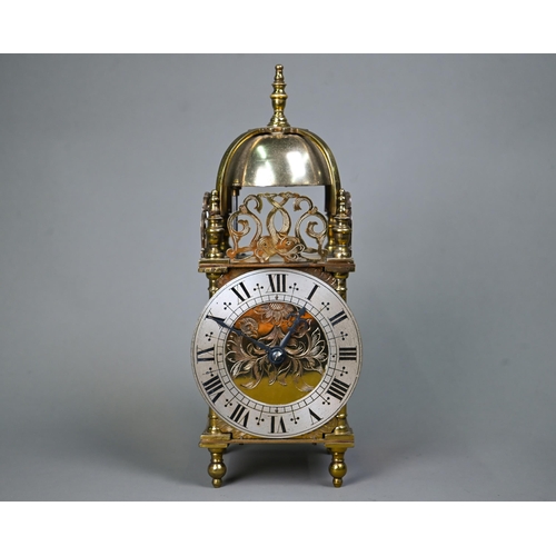 1016 - A contemporary miniature brass lantern clock, the 8-day movement striking the hours and half hours o... 