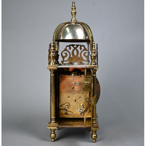 1016 - A contemporary miniature brass lantern clock, the 8-day movement striking the hours and half hours o... 