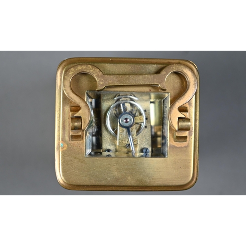 1017 - A miniature brass cased carriage alarm clock, 9 cm h