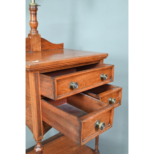 1020 - A circa 1900 dressing stand with octagonal framed adjustable mirror over three drawers and open shel... 