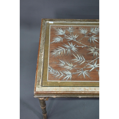 1023 - A 1930s faux bamboo framed coffee table, the glazed-in top of ivory and penwork inlaid rosewood, 118... 