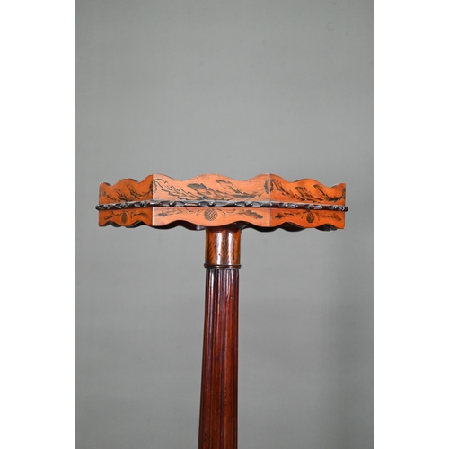 1033 - A Sheraton inlaid satinwood and mahogany torchere, the octagonal top with wavy edged gallery raised ... 