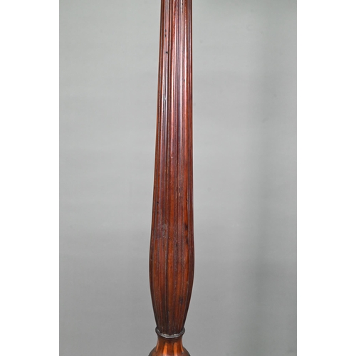 1033 - A Sheraton inlaid satinwood and mahogany torchere, the octagonal top with wavy edged gallery raised ... 