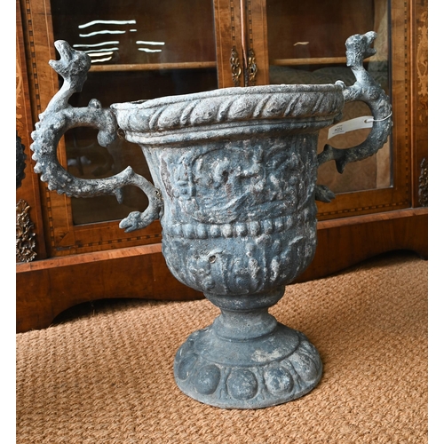 1034 - A pair of antique classical style lead urns, with dragon handles, 56 cm h (2)