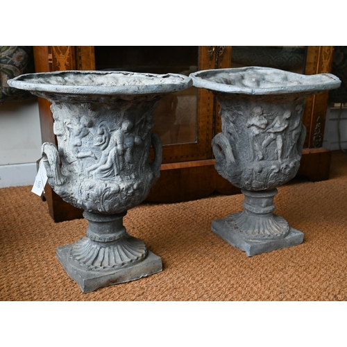 1035 - A pair of antique campana style lead urns, with loop handles, 56 cm h (2)