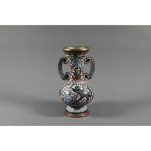 507 - A 19th century Japanese brass cloisonne on brass vase of archaistic baluster form with scroll handle... 