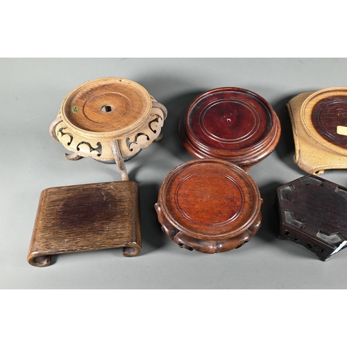 520A - Eleven various Chinese stained hardwood carved and pierced display stands (11)