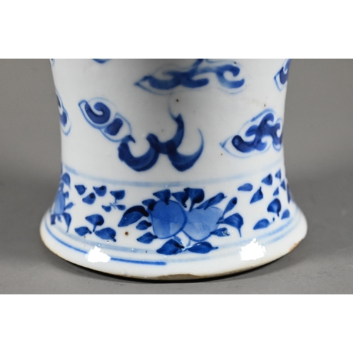 525 - A 19th century Chinese blue and white 'dragon' vase and domed cover with moulded guardian lion finia... 