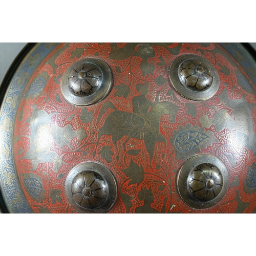 526 - A pair of Indian Benares brass circular shields, dhal, each with four raised bosses chased engraved ... 