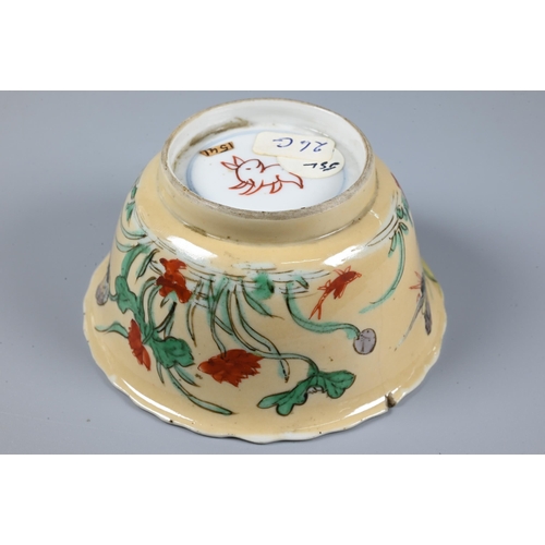 542 - An 18th century Chinese famille verte and cafe-au-lait tea bowl painted in polychrome enamels with l... 