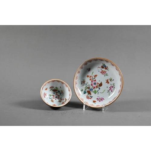 550 - An 18th century Chinese famille rose and cafe-au-lait tea bowl (6 cm diameter) and matching saucer (... 