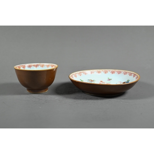 550 - An 18th century Chinese famille rose and cafe-au-lait tea bowl (6 cm diameter) and matching saucer (... 