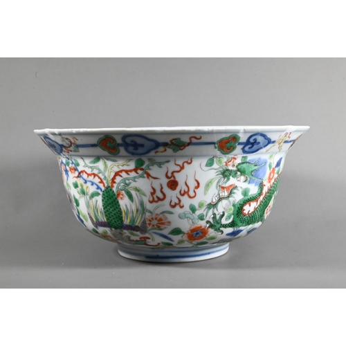 561 - A late 19th or early 20th century (Kangxi Revival) Chinese wucai 'dragon and phoenix' bowl, painted ... 