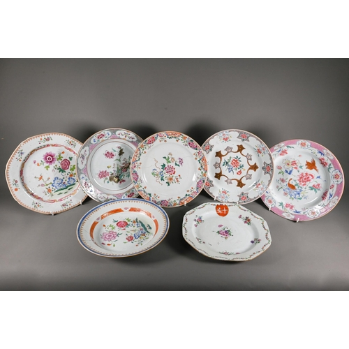 569 - Six 18th century Chinese famille rose plates (four circular and two octagonal) painted with a variet... 