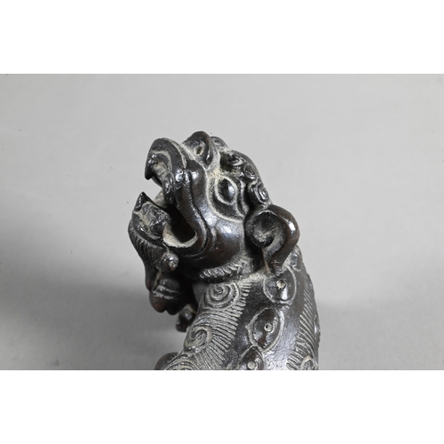 571 - A 19th century Chinese bronze figure of a Buddhistic guardian lion, possibly an incense stand, Qing ... 